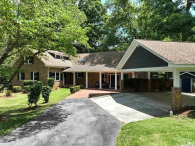 Tucked away on 3.84 sprawling acres with its own private - photo 1