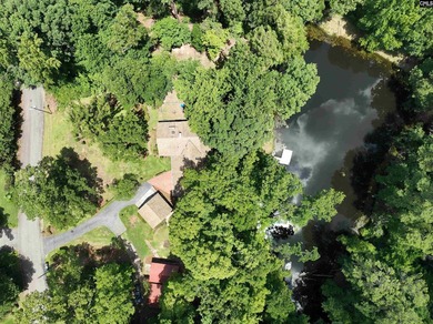 Tucked away on 3.84 sprawling acres with its own private - photo 4