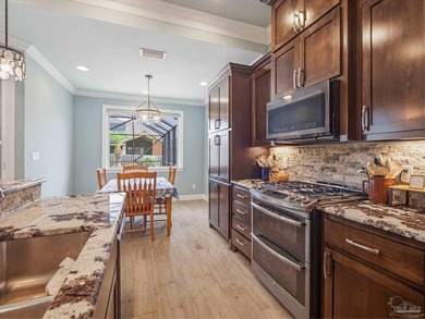 This stunning custom-built luxury home is perfectly positioned - photo 22