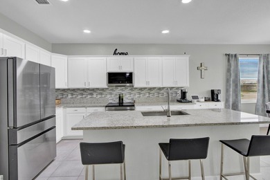 Built in 2019, this beautifully maintained 4-bedroom, 3-bathroom - photo 5