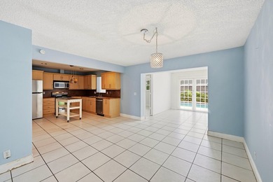 A NEW ROOF welcomes you into this charming pool home in - photo 3