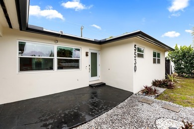 Welcome to this ultra-modern 3-bedroom, 2-bathroom single-story - photo 1