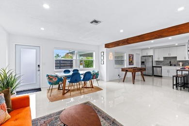 Welcome to this ultra-modern 3-bedroom, 2-bathroom single-story - photo 5