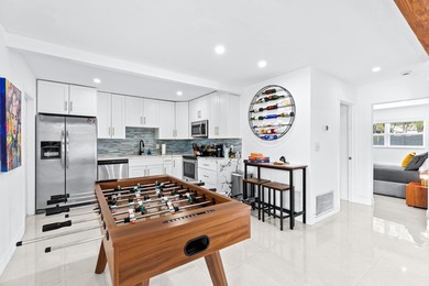 Welcome to this ultra-modern 3-bedroom, 2-bathroom single-story - photo 6