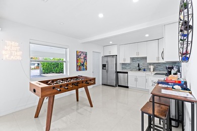 Welcome to this ultra-modern 3-bedroom, 2-bathroom single-story - photo 8