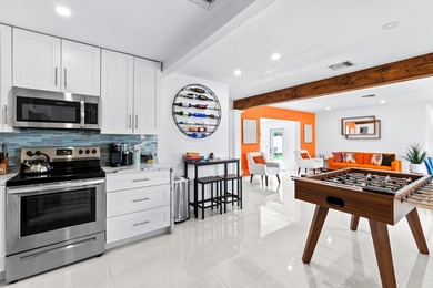 Welcome to this ultra-modern 3-bedroom, 2-bathroom single-story - photo 9