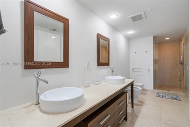 Experience luxury living at Icon Brickell Tower I. This bright - photo 9
