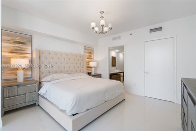 Experience luxury living at Icon Brickell Tower I. This bright - photo 10