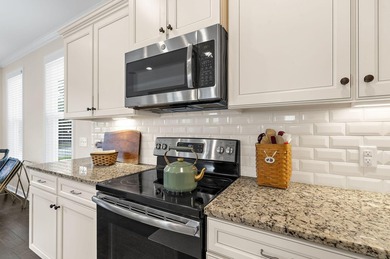 Welcome to this charming Charleston-style home in the highly - photo 11