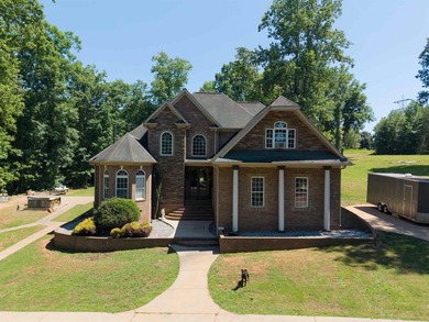 Beautiful 3,256 sq ft custom brick home located in a highly - photo 2
