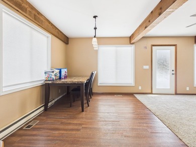 Nestled in the Lakes of the North HOA, this chalet offers the - photo 2