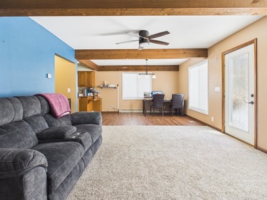 Nestled in the Lakes of the North HOA, this chalet offers the - photo 3