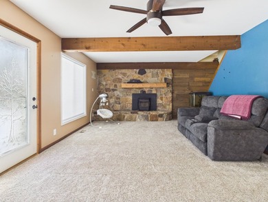 Nestled in the Lakes of the North HOA, this chalet offers the - photo 4