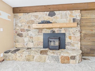 Nestled in the Lakes of the North HOA, this chalet offers the - photo 5