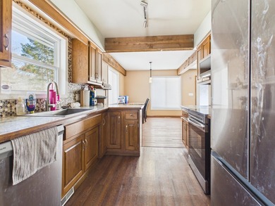Nestled in the Lakes of the North HOA, this chalet offers the - photo 7