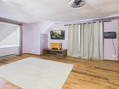 Nestled in the Lakes of the North HOA, this chalet offers the - photo 9