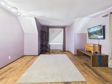 Nestled in the Lakes of the North HOA, this chalet offers the - photo 10