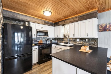 Lake living and just in time for spring and summer! Check out - photo 3