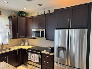 Lakefront serenity meets refined living in Mizner Pointe - one - photo 2