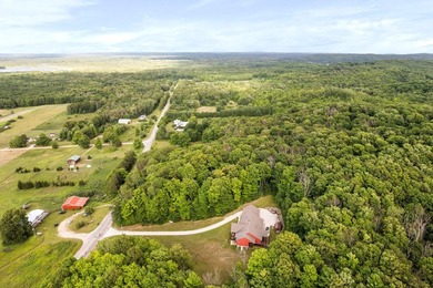 With a commanding overlook of Sturgeon Bay, Cecil Bay, the