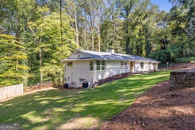 RARE ONE-ACRE OPPORTUNITY IN CHASTAIN PARK! Fully renovated and - photo 49
