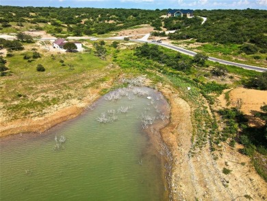 Build your home away from home on the banks of Lot 11 in the - photo 11