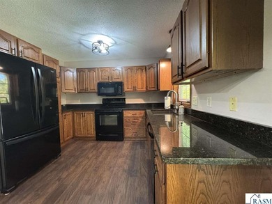 Country living on 2 1/2 acres awaits you with this updated 4