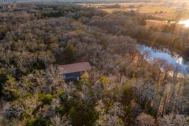 This beautiful 11-acre property is a true nature lover's - photo 2