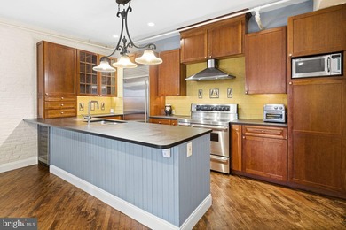 This beautifully updated penthouse offers a unique blend of - photo 6