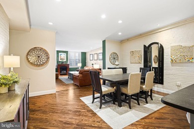This beautifully updated penthouse offers a unique blend of - photo 7