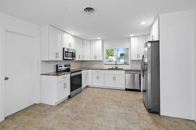 Fantastic updated 4 bedroom, 2 bath home, well located on - photo 7