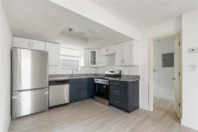 WATERFRONT! FULL IN-LAW QUARTERS/GUEST SUITE/APARTMENT with its - photo 22