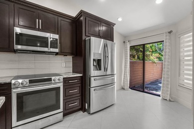 Welcome to this beautifully remodeled townhome, where style - photo 7