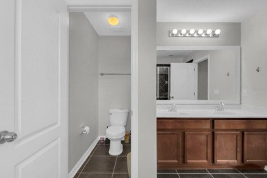 Short Sale. Welcome to a townhouse that makes everyday living - photo 13