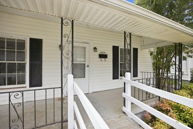 Large fenced in backyard, perfect for entertaining. Discover the - photo 4