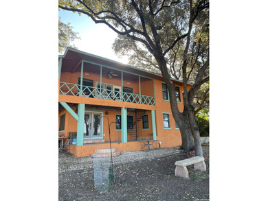 This 112ft wide waterfront lot is loaded with over 40 beautiful - photo 2