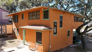 This 112ft wide waterfront lot is loaded with over 40 beautiful - photo 3