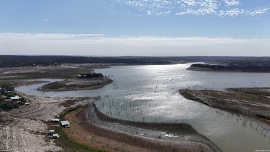 This 112ft wide waterfront lot is loaded with over 40 beautiful - photo 5