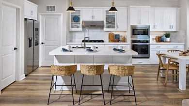 This spacious two-story paired home for residents ages 55 and - photo 4