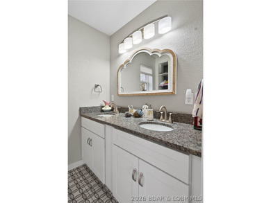 This 3-bedroom, 2.5-bath lakefront home offers over 2,000 square - photo 26