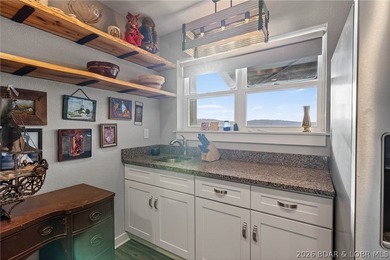 This 3-bedroom, 2.5-bath lakefront home offers over 2,000 square - photo 37