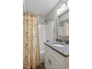 This 3-bedroom, 2.5-bath lakefront home offers over 2,000 square - photo 42