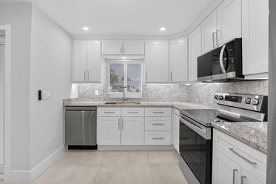 THIS IS THE ONE YOU HAVE BEEN WAITING FOR! FULLY RENOVATED WITH - photo 2
