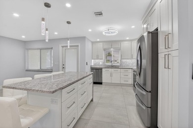 THIS IS THE ONE YOU HAVE BEEN WAITING FOR! FULLY RENOVATED WITH - photo 3