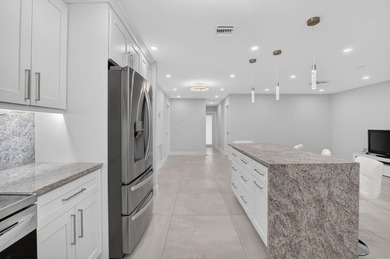 THIS IS THE ONE YOU HAVE BEEN WAITING FOR! FULLY RENOVATED WITH - photo 4