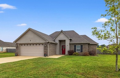 Take a look at this like-new, 3-bedroom, 2-bath home with an - photo 1