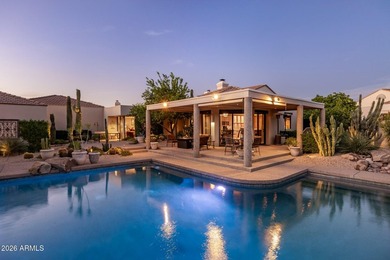 Refined desert living beckons beyond a striking glass gated - photo 2