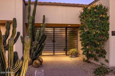 Refined desert living beckons beyond a striking glass gated - photo 4