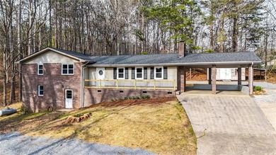 Welcome home to this beautifully renovated 1975 gem that - photo 1
