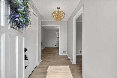 Welcome home to this beautifully renovated 1975 gem that - photo 3